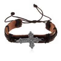 Skórzana bransoletka brązowego koloru z czarnymi sznurkami, ozdobnie wycięty krzyż